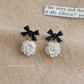 Black Bow Stud White Pearlescent Rose Flower Drop Earrings view 4