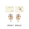 Gold Tone Purple Iris Clear Stone And Teardrop Stud Earrings view 3