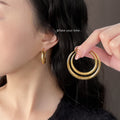 Gold Tone Textured Round Hoop Earrings In Two Graduated Sizes view 3