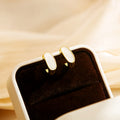 Gold Mini Hoop Stud Earrings Black White Oval Enamel Inlay view 4