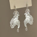 Textured Leaf Drop Earrings In Gold And Silver With Decorative Details view 4
