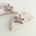 Purple Lavender Enamel Flower Stud Earrings Gold Rim view 1