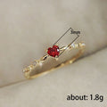 Red Heart And Clear Stone Vine Ring In Gold And Silver Tones view 4