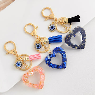 Resin Chip Heart Charm Keychain with Evil Eye Rhinestone and Tassel Accent