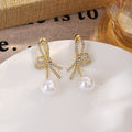 Gold Crystal Look Bow Pearl Look Convertible Stud Earrings view 2