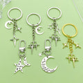 Celestial Charm Keychains Featuring Gold-Tone Stars Across 15 Pictured Variations view 4