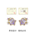Gold Tone Purple Star Clear Stone And Small Star Stud Earrings view 3