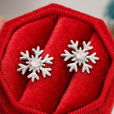Image 1 showing layered snowflake crystal stud earrings