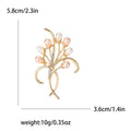 Pearl Floral Branch Bow Brooch With Faceted Crystals And Polished Metal Details view 5