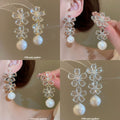 Silver Tone Floral Crystal Pearl Drop Stud Earrings view 1