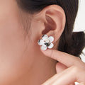 Five Petal Flower Stud Earrings Gold and Steel Finishes view 3