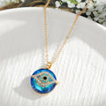 Gold and Silver Tone Blue Evil Eye Pendant Necklaces in Five Styles view 6
