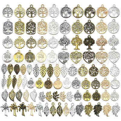 Gold-tone seashell charms arranged on a light background