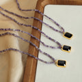 Purple Faceted Bead Necklace Black Square Gold Frame Pendant view 4