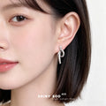 Silver Tone White Pearl And Clear Stone Ribbon Stud Earrings view 2