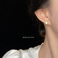 Square Cream Cat Eye Glass Stud Earrings Gold Frame view 2