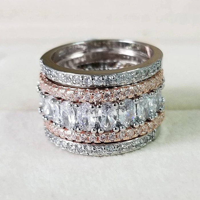 Two-Tone Wide Band Ring With Baguette and Round Clear Stones