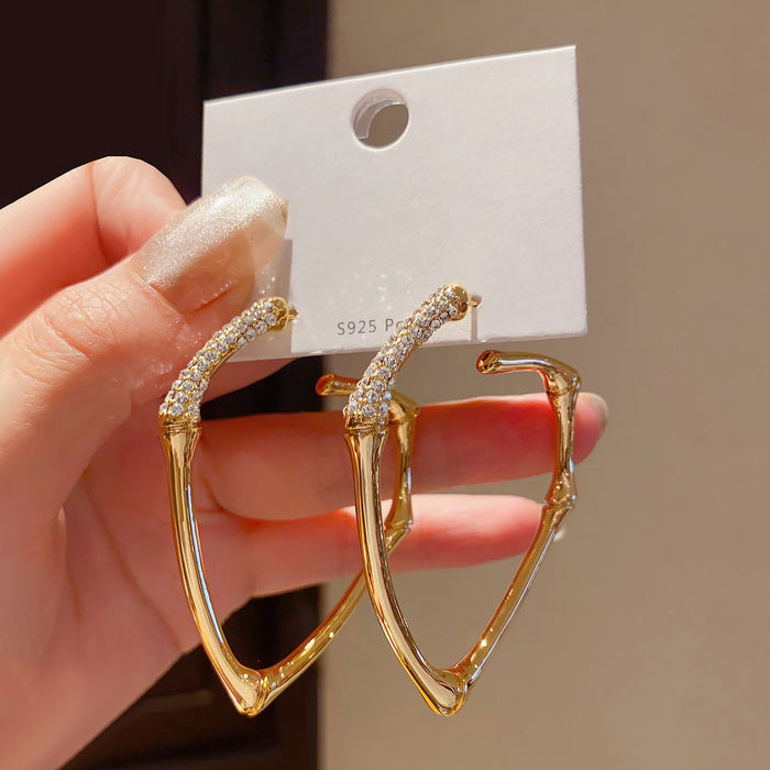 Gold Tone Slender Angular Bamboo Style Hoop Earrings