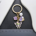 Purple Pink and Blue Heart Pearl Flower Butterfly Keychain Collection view 3