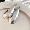 Faceted Teardrop Metal Earrings in Four Gold and Silver Finishes view 9