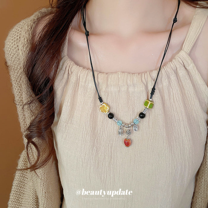 Black Multi Cord Ceramic Bead Fortune Charm Necklace