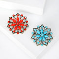 Openwork Radiating Flower Brooch in Red or Turquoise view 1