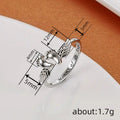 Engraved Angel Wings And Baby Feet Open Ring In Silver Tone view 4