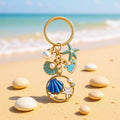Blue and Pink Shell Dolphin Mermaid and Starfish Keychains view 2