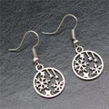 Snowflake and Star Round Drop Earrings in Silver Tone view 2