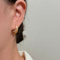 Gold Tone Curved Crystal Huggie Hoop Earrings For Women view 2
