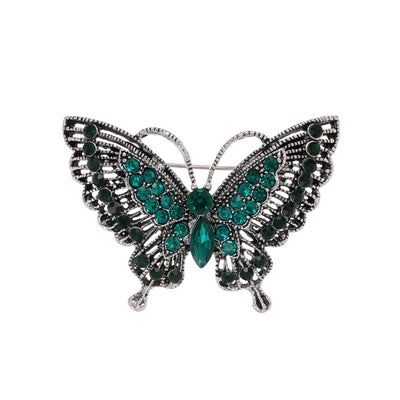 Front product view of the butterfly brooch pin in silver and aqua