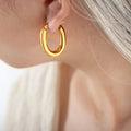 Gold Polished Thick Oval Hoop Earrings Latch Closure Pair view 4