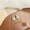 White Disc Green Bamboo Gold Tone Delicate Hook Earrings view 2