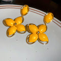 Floral Drop Earrings With White or Yellow Petal Clusters view 7