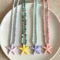 Four Color Round Bead Necklaces With Gold Tone Starfish Pendants view 4