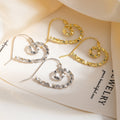 Hammered Gold and Silver Spiral Heart Hook Earrings view 1