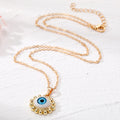 Gold Tone Realistic Eye Pearl Border Pendant Necklaces in Three Colors view 4