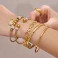 Heart Crystal and Geometric Bangle Collection in Two Metal Tones view 4
