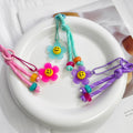Smiley Face Daisy Flower Braided Cord Charm with Bead Accents view 1
