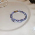 Four Mixed Pink Purple And Clear Crystal Bracelet Designs In Silver Tone view 9