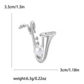 Pearl Saxophone Brooch With Faceted Crystals And Polished Metal Details view 5