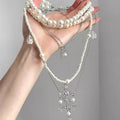 Layered Pearl and Crystal Cross Pendant Necklace Jewelry view 1