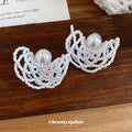 Layered Crystal Wave Stud Earrings With Pearl Centers view 2