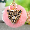 Gold Leopard Head Keychains with White Pink and Gray Rabbit Fur Poms view 7