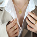 Abstract Face Oval Disc Pendant Necklace Gold Rose Gold view 1