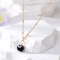 Gold and Silver Tone Round Glass Evil Eye Bead Pendant Necklaces in Seven Colors view 3