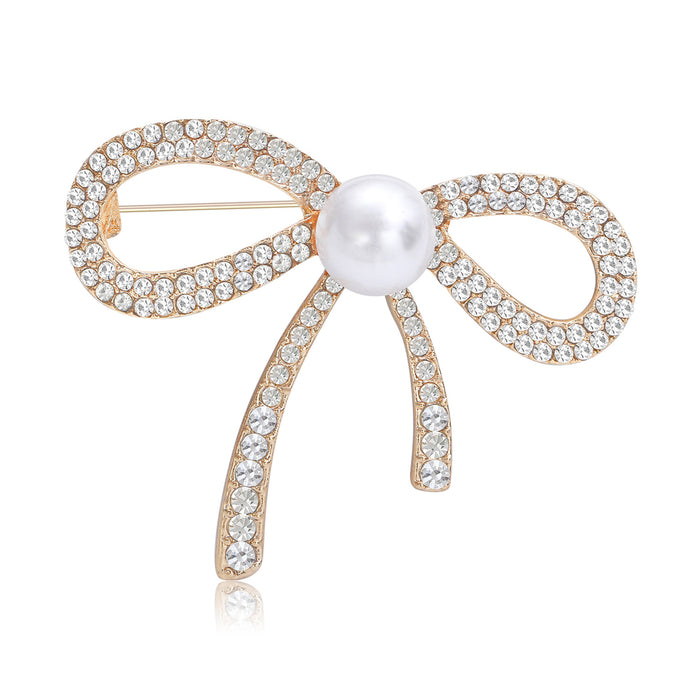 Crystal Ribbon Bow Brooch With Central Faux Pearl Accent