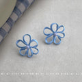Matte Blue Open Flower Stud Earrings Pearl Center Accent view 3