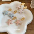 Pastel Starfish Drop Earrings in Pink Blue and White view 3