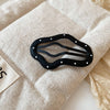 Black Irregular Oval